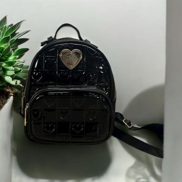 Betsey Johnson Handbags - Betsey Johnson Black Backpack with Floral Lining